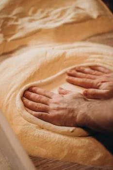 head baker preparing artisan bread